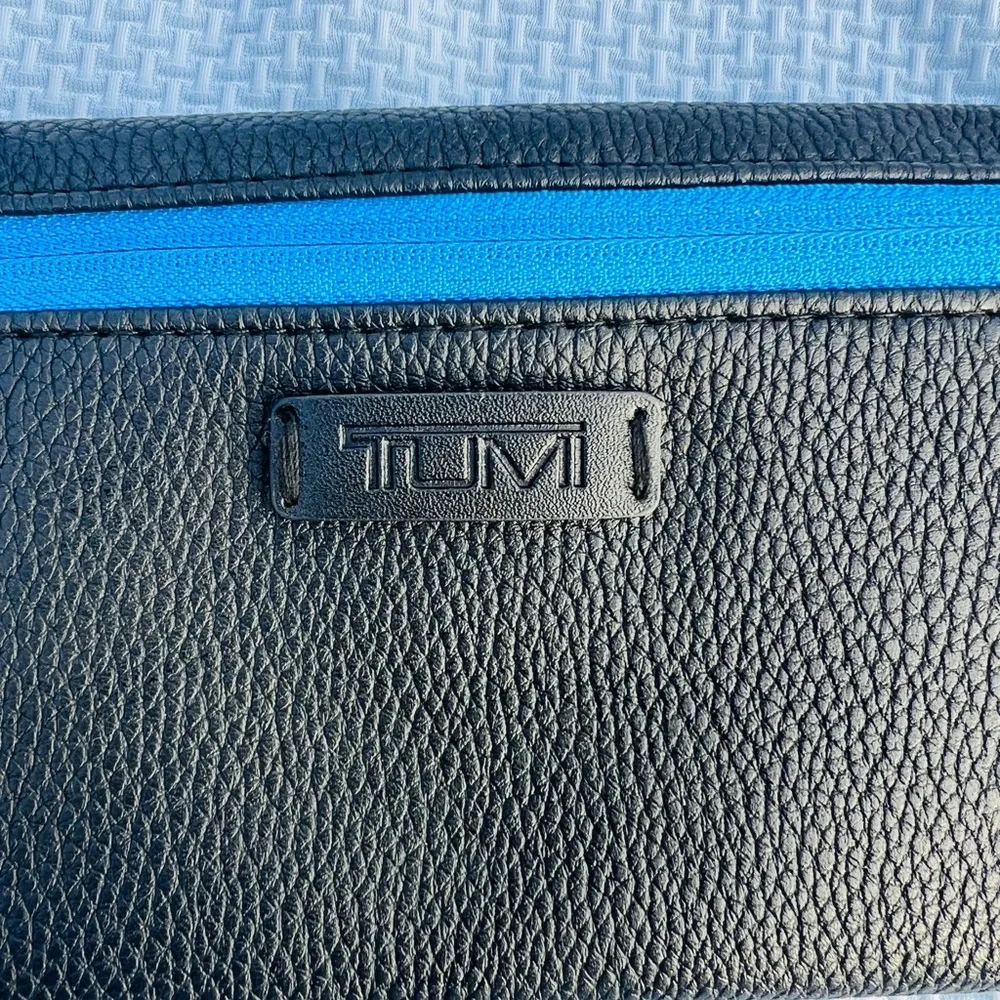 Tumi Black and Blue Toiletry Bag